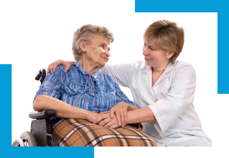 smiling elderly woman being administered to by a friendly nurse